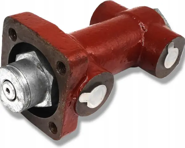 Część hamulca ciągnika Zetor: metalowy element z czerwonym korpusem i srebrnymi zaślepkami.